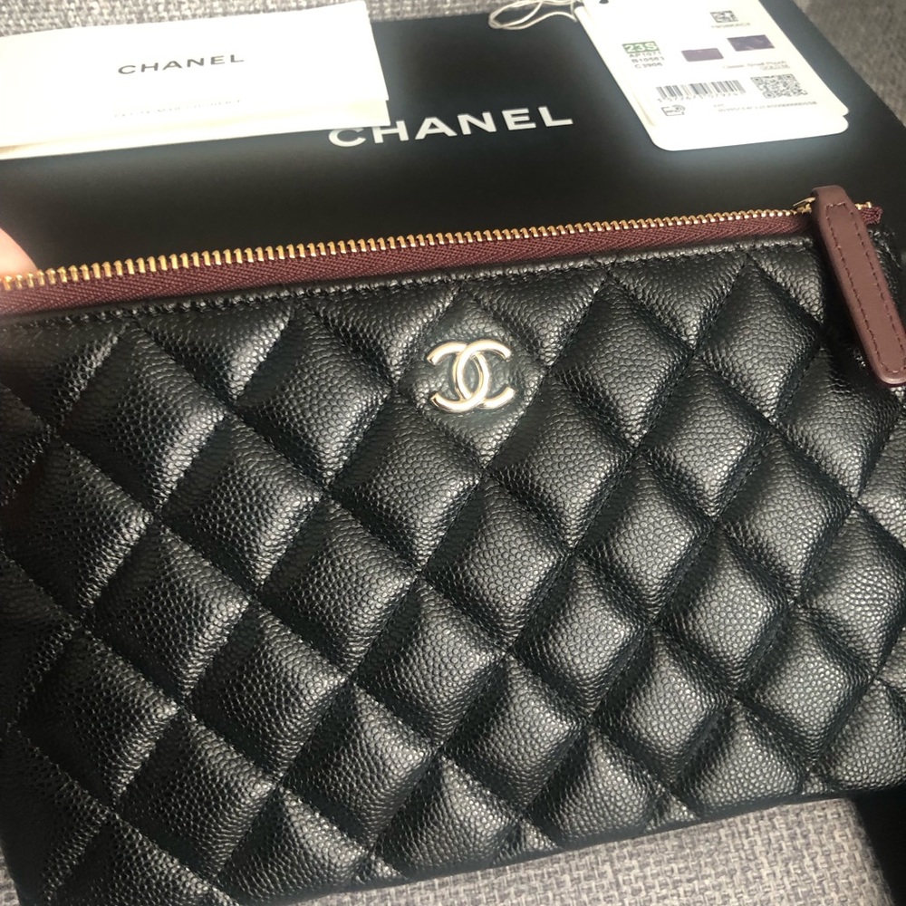 Chanel small pouch 23S black with gold hardware burgundy interior